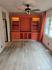 Built in hutch in dining room w/ceiling fan