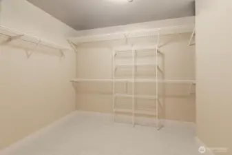 An expansive walk-in closet with ample storage.