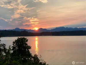 Golden sunsets stretch across the water toward the majestic Olympic Mountains — their peaks often dusted in snow, creating a breathtaking Northwest backdrop. At 9549 Olympus Beach, every evening feels like a front-row seat to nature’s most spectacular show.