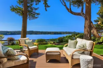 Expansive view deck overlooking the water, designed for relaxed outdoor living with space to gather, unwind, and take in the serene natural setting.