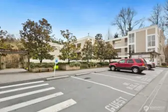 Front of building with plenty of guest parking