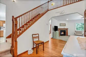 Unique pass thru from open staircase to kitchen