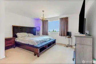 Large main bedroom on second floor with Valley view