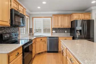 Lots of elbow room in the kitchen. All stainless steel appliances and sink.