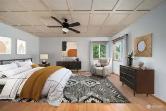 Virtually staged primary bedroom. Coffered Ceiling wood lattice work, ceiling fan and Columbia laminate flooring are real.
