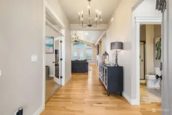 The front foyer opens into the great room with the office on the left and a bedroom and guest bath on the right.