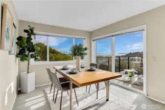 The dining area flows right outside to the deck, making this an idea space to entertain and enjoy the views!