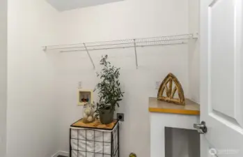 Laundry area with storage