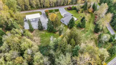 All the space, trees, yard, pond. This home has it all