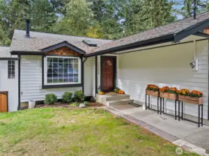 This beautifully updated home had a new grey roof installed (2022), fresh exterior paint (Oct 2025), and check out that gorgeous front door!!