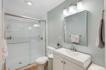 Walk down the hallway to the next bathroom that was remodeled to also extend the shower!