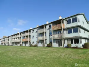 Rear of the Canterbury Inn. #303 is on the top floor, 2nd deck in from the right.