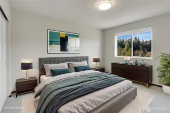 This is the 2nd bedroom on the main floor. Virtually staged.