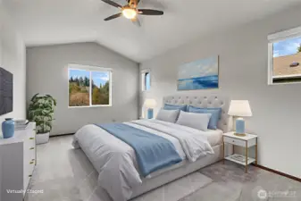 The Owner’s Suite, located on the upper level, is complemented by a vaulted ceiling with a ceiling fan and several windows creating a light and bright space! Virtually staged.