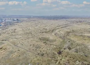 Aerial drone shot of the dirt road below the property.