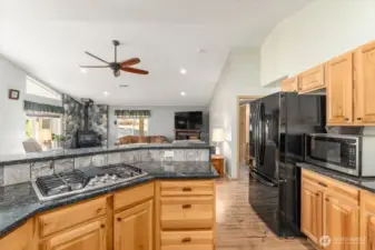 Kitchen looking towards eating bar and living room.