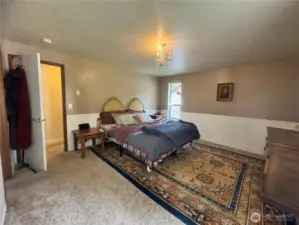 The primary suite includes a walk-in closet, a double vanity bathroom with a large soaking tub, walk-in shower and a large skylight, and it's all on the main floor!