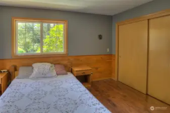 2nd Bedroom has a large closet and a sliding glass door for access to the porch/hot tub.  Enjoy soaking outside on a cool evening night!