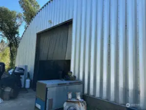 Front door to Quonset metal building.