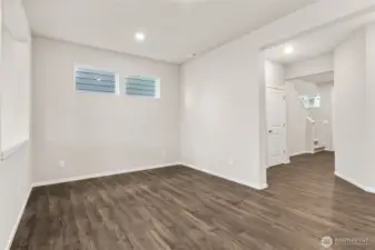 Dining Room and Entry. Photos of previously built home of same floorplan. Colors, Specifications, and Options may vary on actual home.