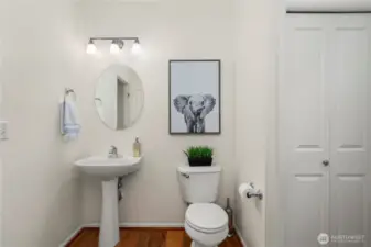 Main floor powder room (LOTS of room to add a bath tub or walk-in shower)