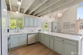 New cabinets in kitchen with quartz countertops