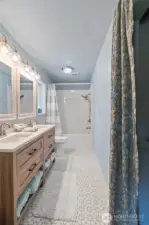 Ensuite bath, linen storage on right side