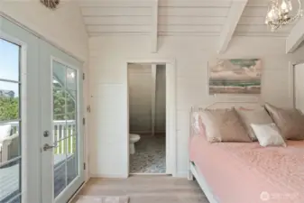 Entrance to ensuite bath, doors to deck