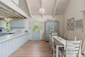 View to dining area, beautiful kitchen peninsula with seating