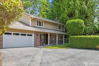 Enter down a long private driveway. Brand new garage door and opener.