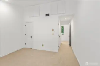 bedroom #2 on first floor with vaulted ceilings.