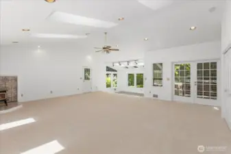 on the main floor you'll find this amazing rec room, great for gatherings, a pool table, music or craft room.....the ideas are unlimited for this magical space.