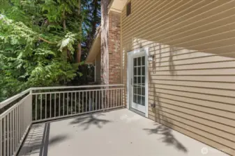 Primary suite has private deck just step through the beautiful glass doorway.