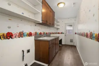 Lower Level Laundry Room w/ access to back yard.