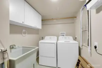 Utility room located downstairs.
