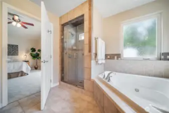 Soaking tub and walk-in tile shower!