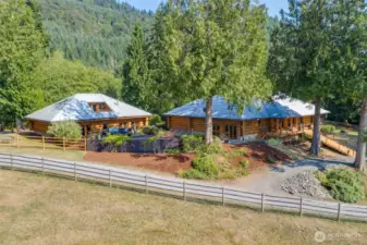 4 car garage with ADU on left and main house on right
