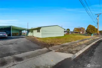 The home shares a driveway with the home next door.