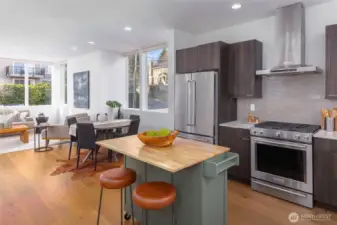 Huge open living, dining, and kitchen with dedicated space for everything!