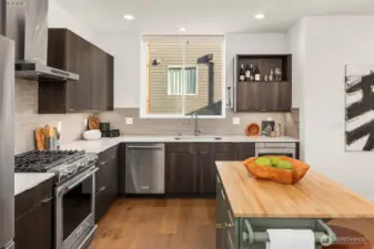 Huge open living, dining, and kitchen with dedicated space for everything!