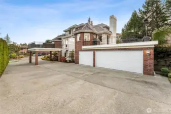 4 covered parking spaces including a 3 car garage and a covered carport.