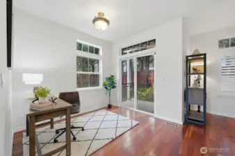 Flex space or 2nd dining room that leads out to 2nd of two private patios on main level