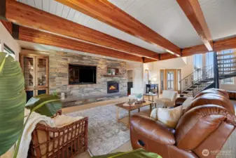 Note the recessed TV niche (TV stays) along with the bookcase storage & cozy fireplace