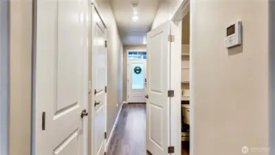 Clean interior hallway with updated flooring and main level access.