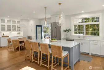 View to the in-kitchen dining room with French doors to the expansive new deck!