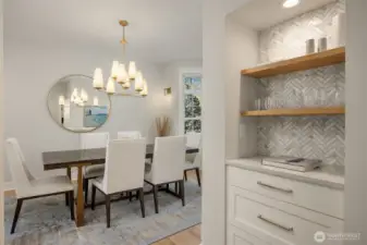 Fontaine Chandelier by Visual Comfort. Built-in drawers and shelving with tile backing.