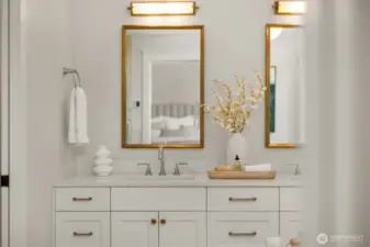 Bathroom Lighting by Visual Comfort, Mirrors from RH, Signature Hardware and Kohler Fixtures. Calacatta tile and Misterio Quartz.