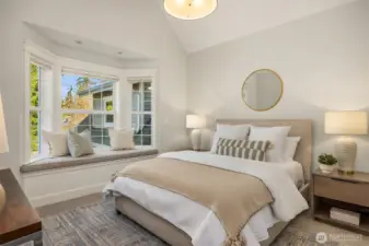Kathy Kuo Pendant, vaulted ceiling and cozy window seat in upper bedroom number two.