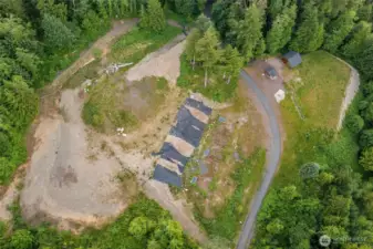 The build site above has been graded and cleared.