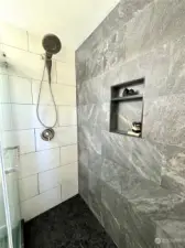 Primary bathroom custom tile shower.